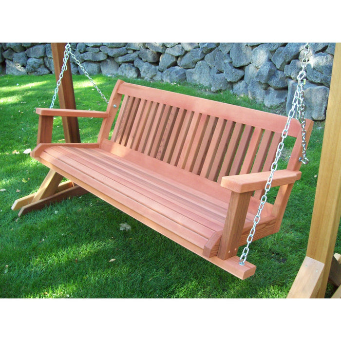 Wood Country Cabbage Hill red cedar porch swing at dusk